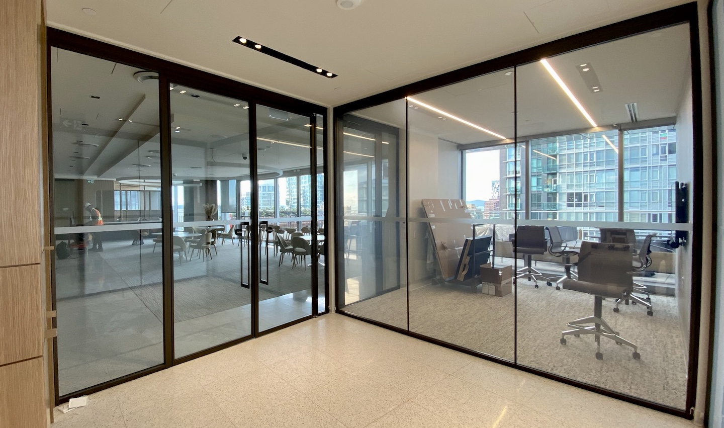 A look at the recent privacy glass installation for a client's Canadian meeting room suites. (Power On)