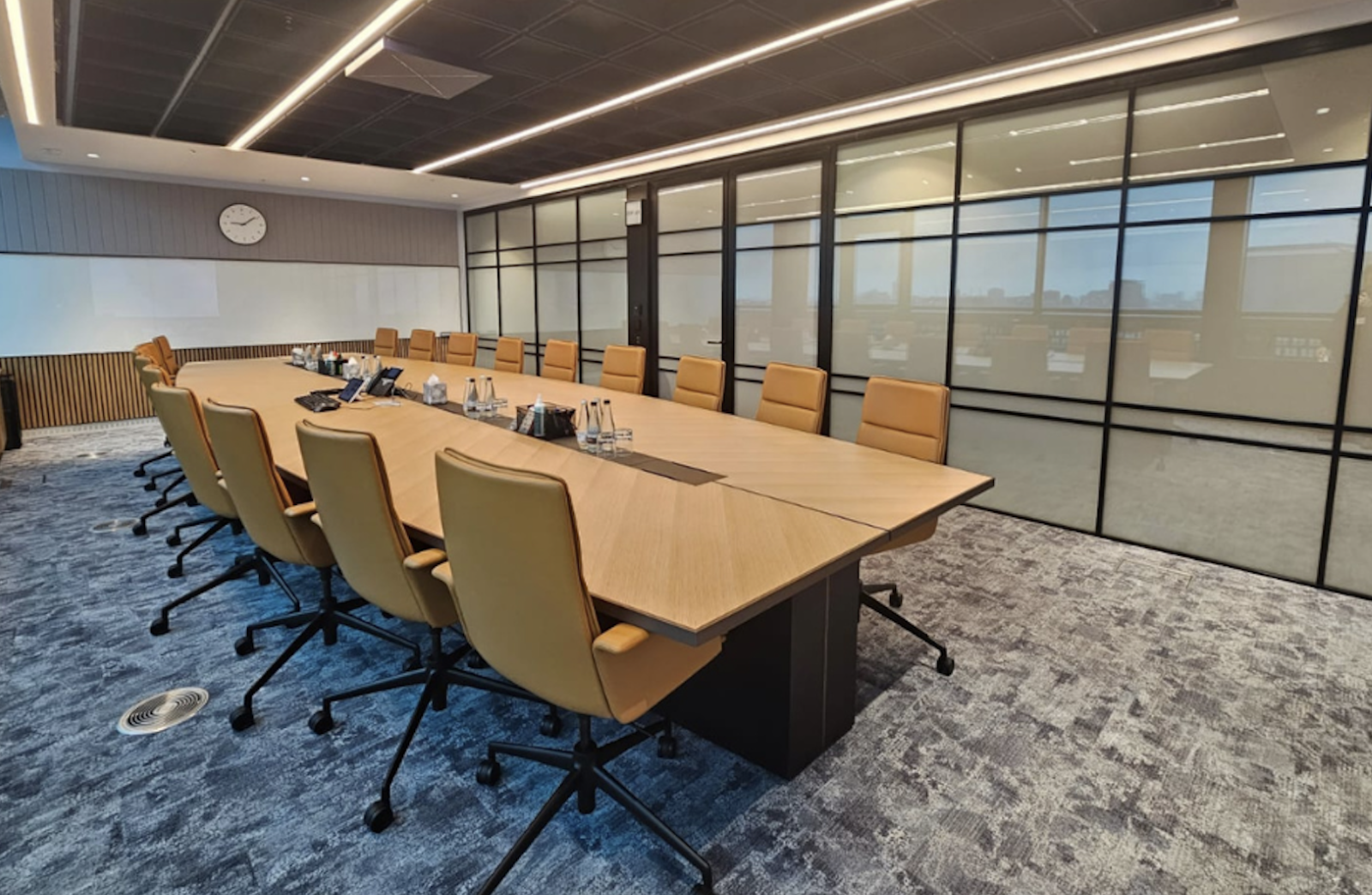 Privacy Smart Glass enhances boardroom privacy with instant opacity, ensuring confidentiality during sensitive meetings.